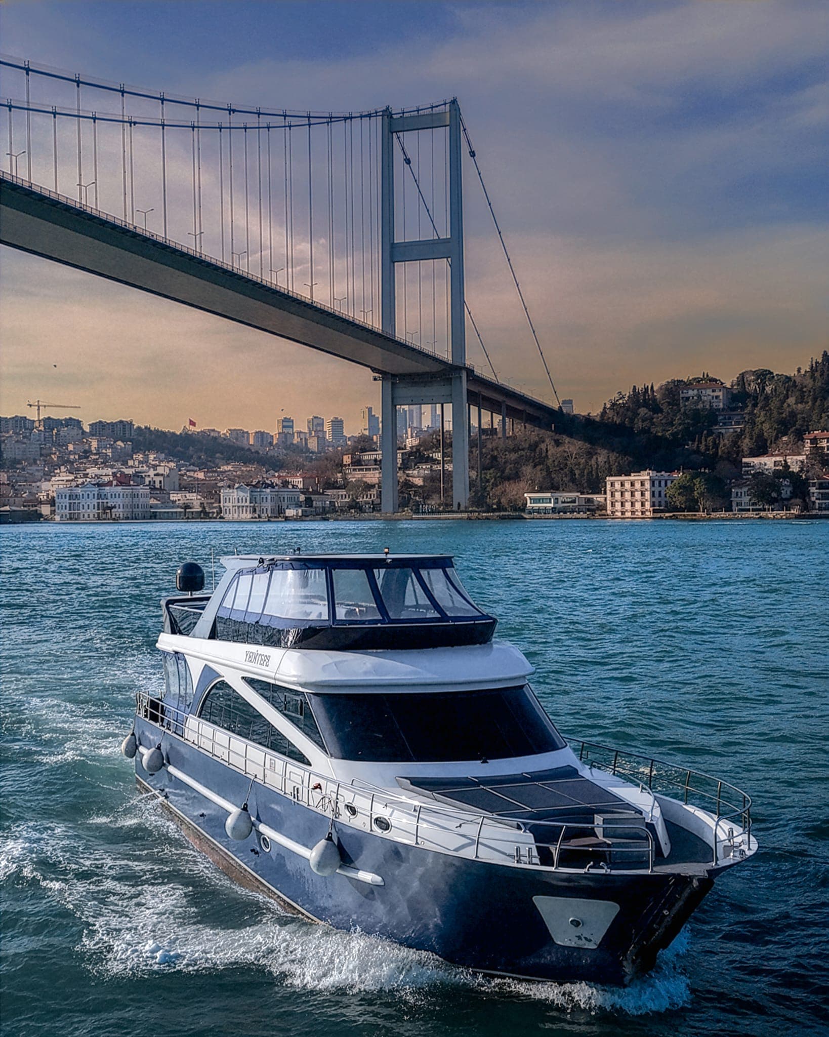 A small group sailing the Bosphorus together at sunset, Istanbul