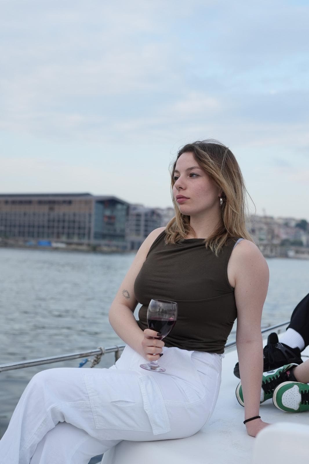 A glass of wine on deck as the Bosphorus turns amber at sunset